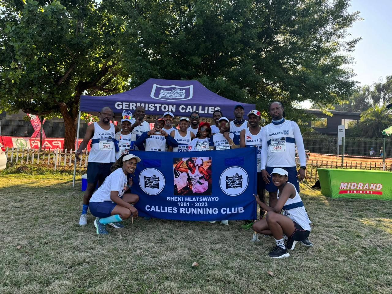 Callies runners with the Bheki Hlatshwayo memorial banner